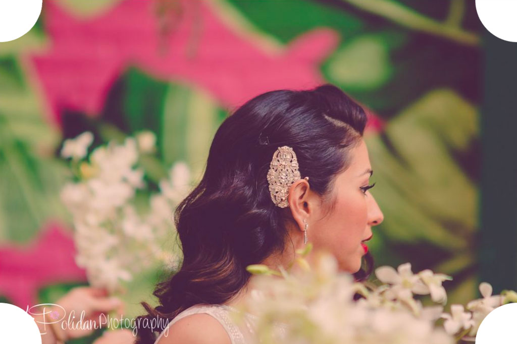 Image of bride from the back with hair do.
